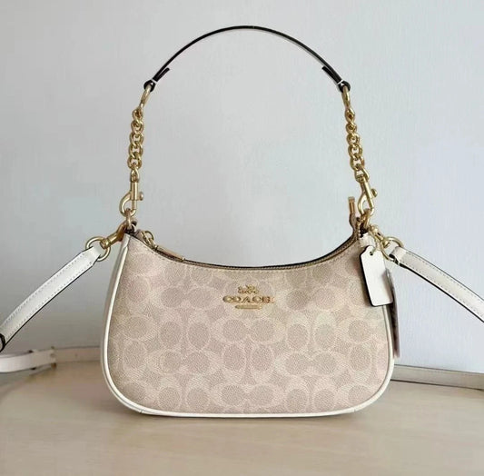 Elegant Monogram Shoulder Bag with Chain Handle & Adjustable Crossbody Strap
