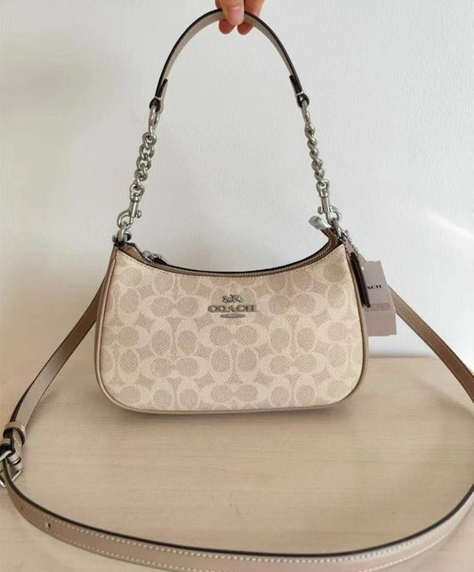 Elegant Monogram Shoulder Bag with Chain Handle & Adjustable Crossbody Strap