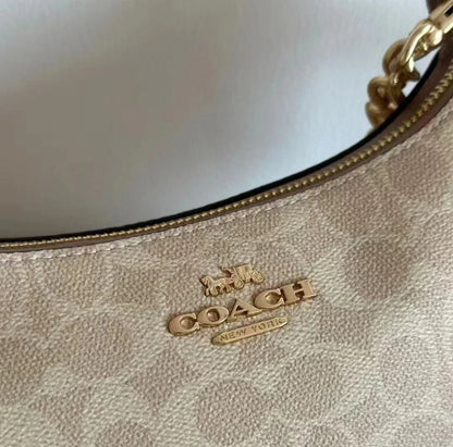 Elegant Monogram Shoulder Bag with Chain Handle & Adjustable Crossbody Strap