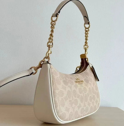 Elegant Monogram Shoulder Bag with Chain Handle & Adjustable Crossbody Strap